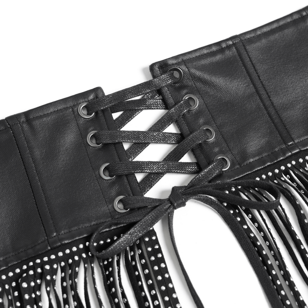 Bold black corset belt featuring studded fringe tassels and adjustable lace-up back for a gothic, edgy look.