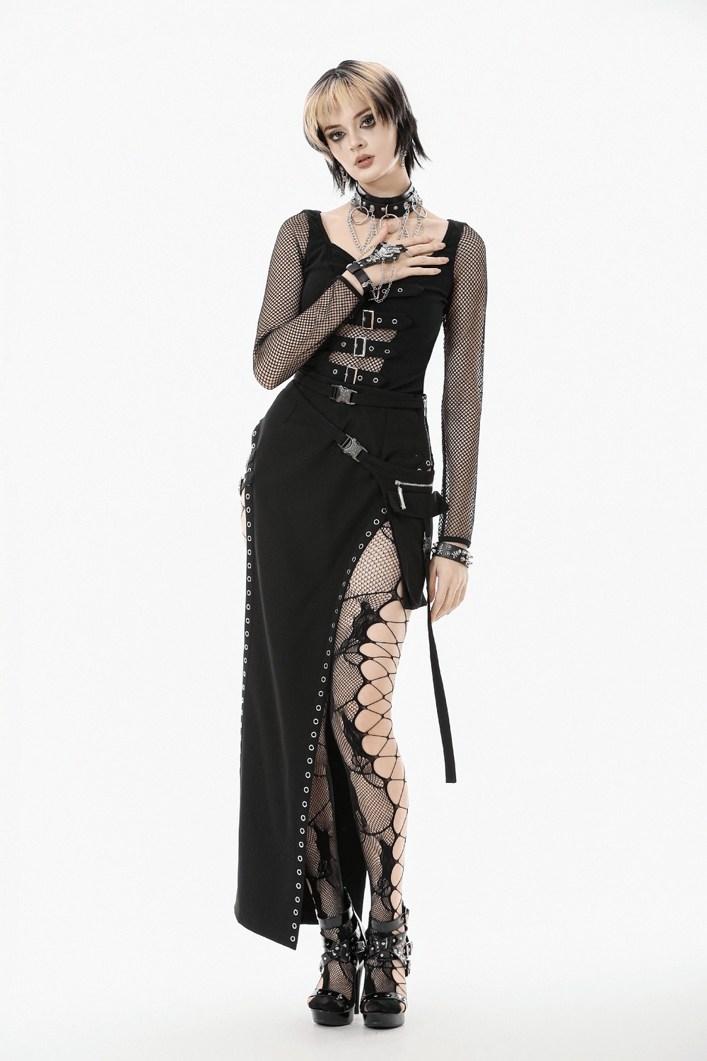 Bold Black Mesh Sleeved Top with Buckle Detailing worn by a model in a dramatic gothic outfit.