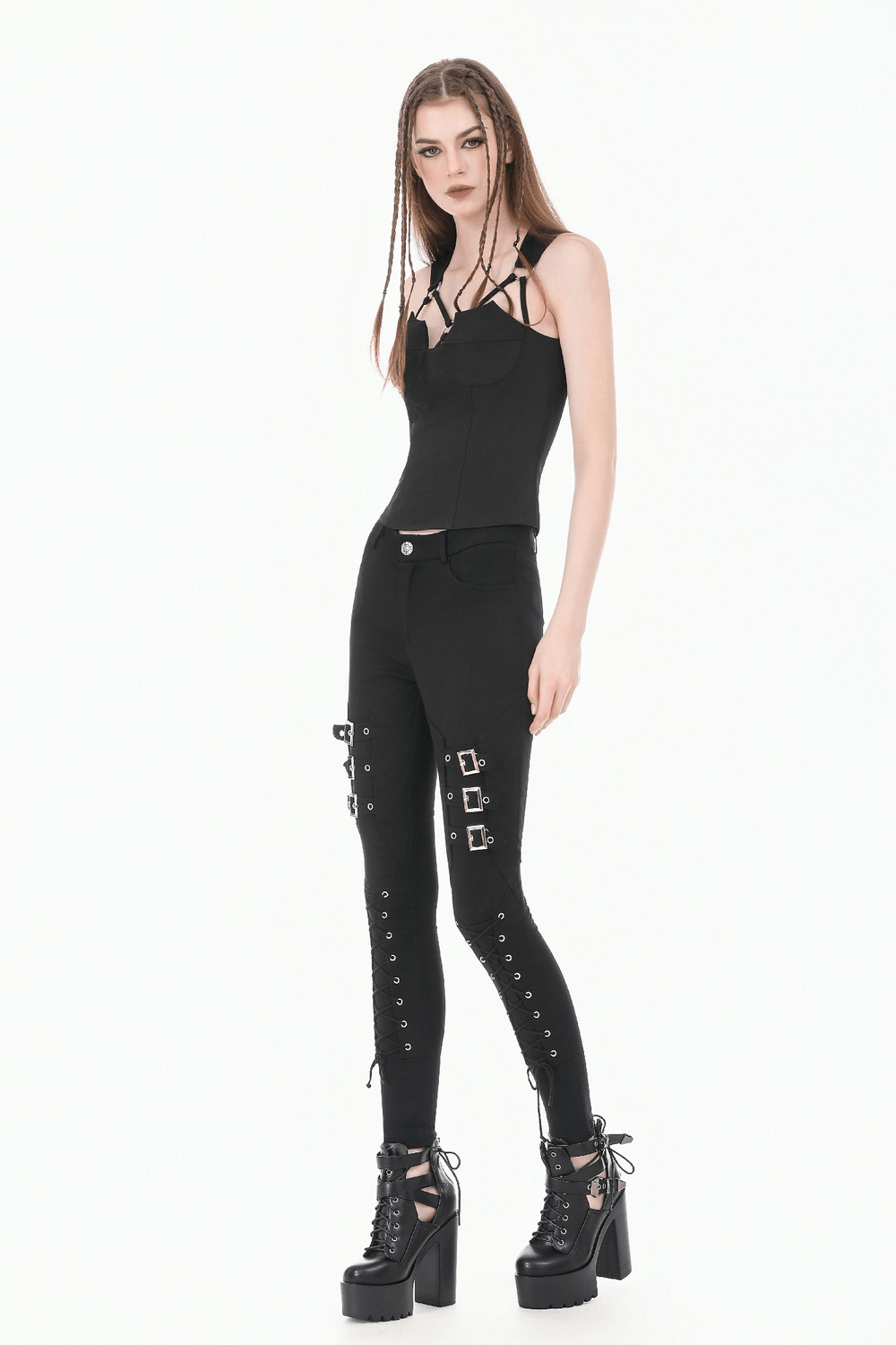 Woman modeling Bold Buckle Strap Lace Up Skinny Pants for Women with corset detail and chunky platform boots.