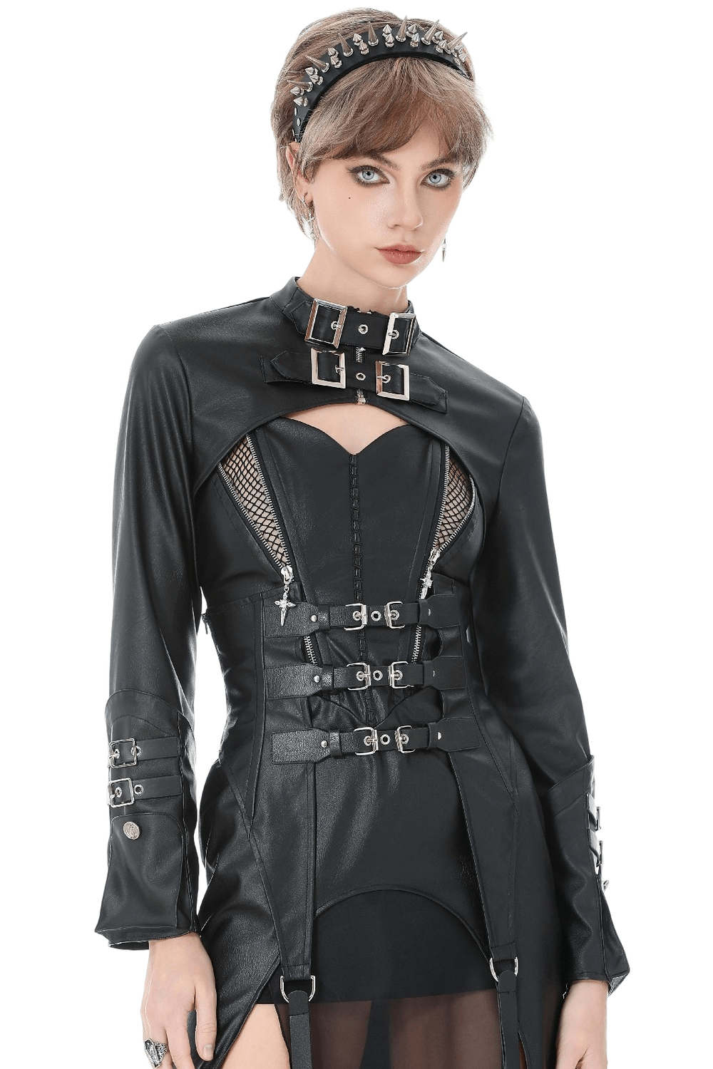 Bold Cropped Cape with Buckles and Long Sleeves worn by model, showcasing edgy faux leather design and buckle details.