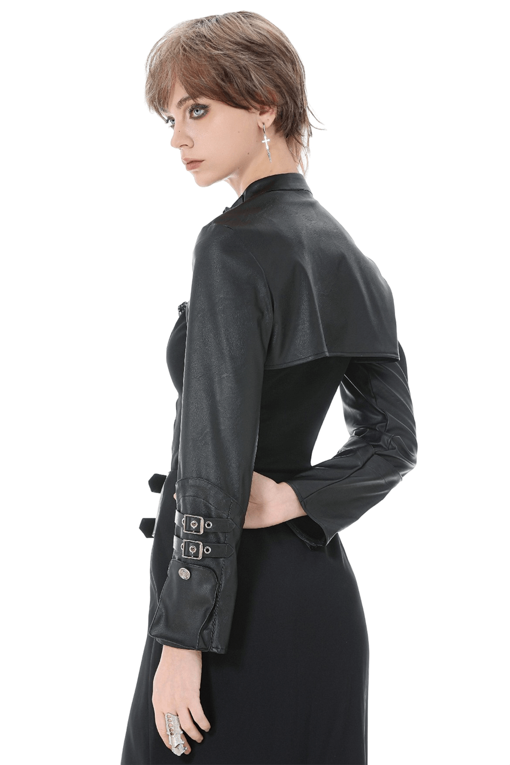 Bold Cropped Cape with Buckles and Long Sleeves worn by a model showcasing its edgy design.
