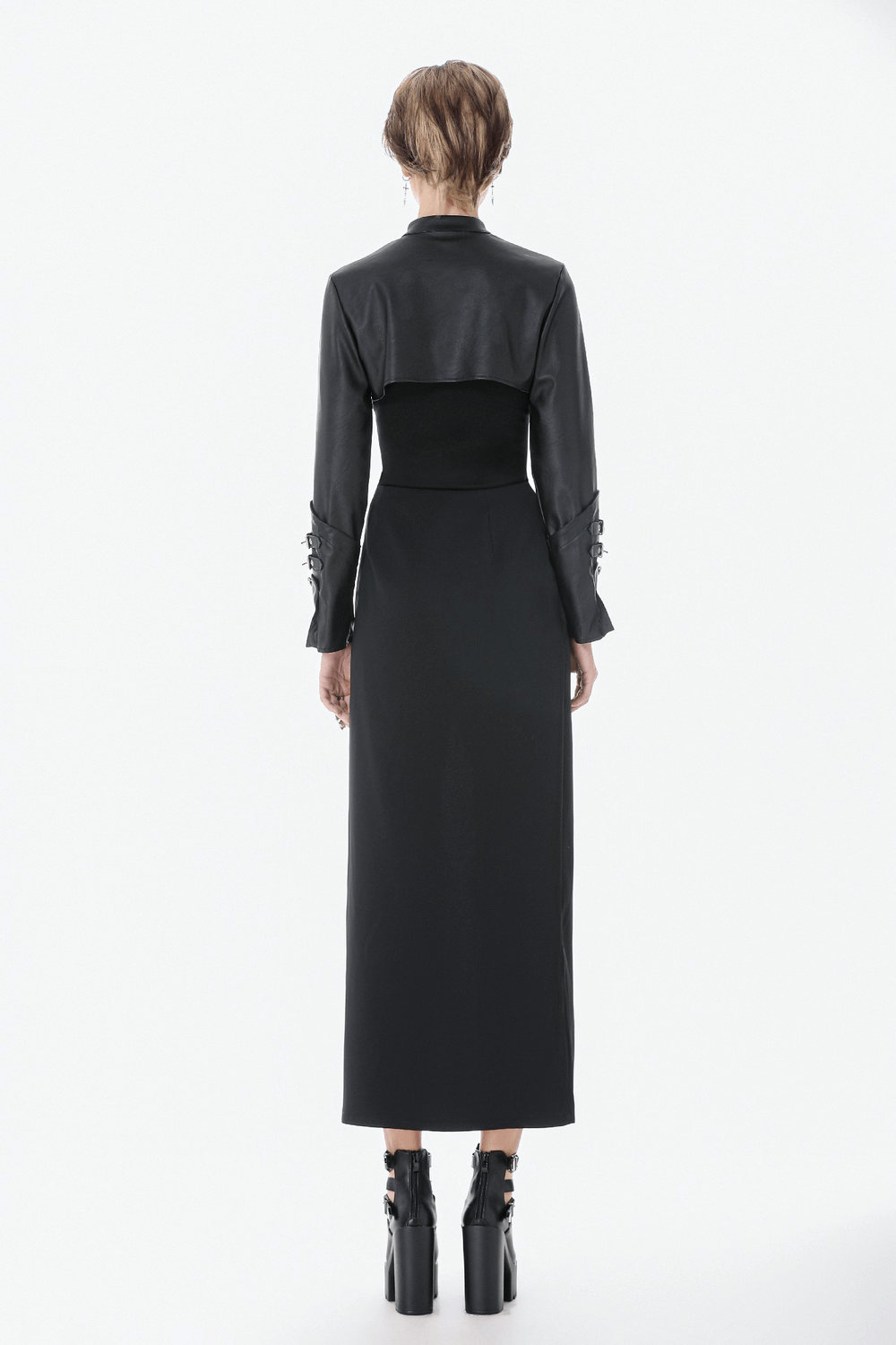 Bold Cropped Cape with Buckles and Long Sleeves - Back view of gothic faux leather cropped cape with long sleeves.