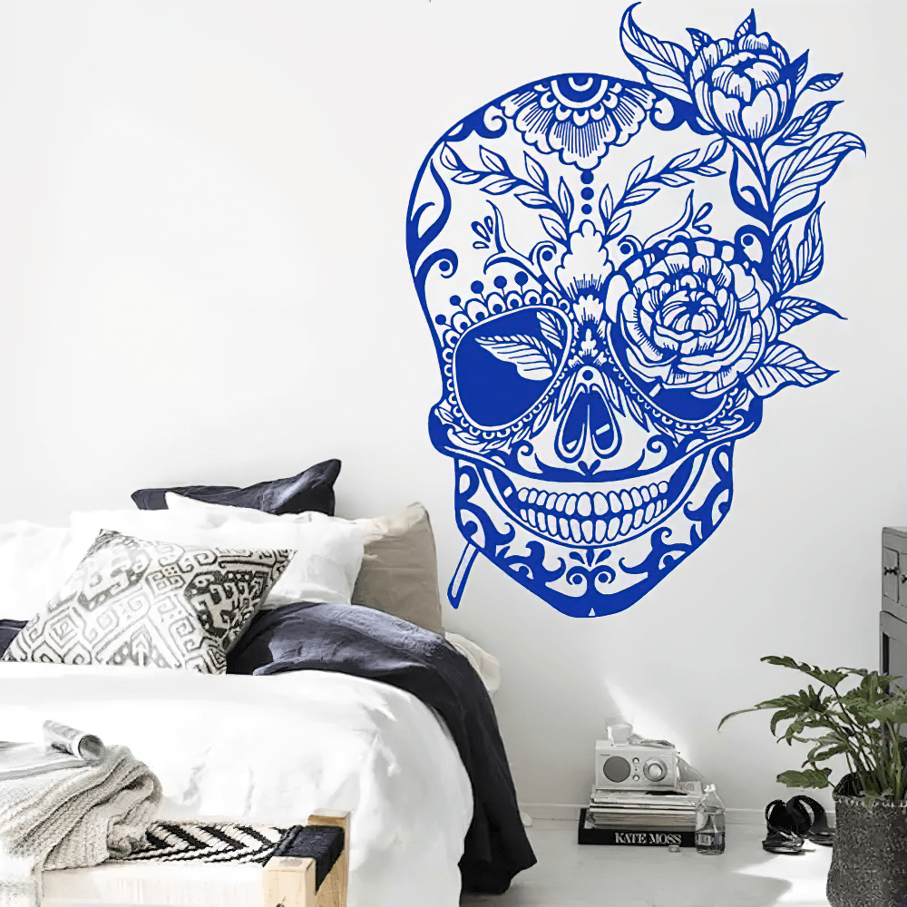 Bold Floral Sugar Skull Day of the Dead Wall Decal in blue with floral designs in a stylish bedroom.