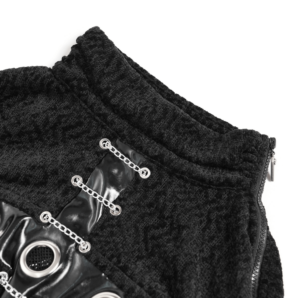 Bold Knit Turtleneck with Faux Leather Straps and Chains close-up showcasing unique eyelet and chain details.