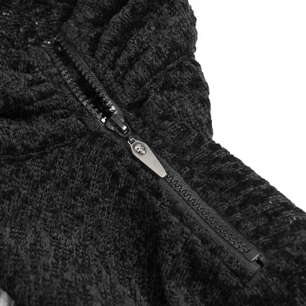 Close-up of the zipper on the Bold Knit Turtleneck with Faux Leather Straps and Chains, showcasing textured black fabric.