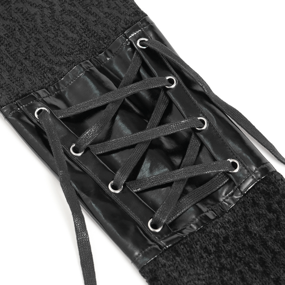 Close-up of lace-up cuff detail on the Bold Knit Turtleneck with Faux Leather Straps and Chains.