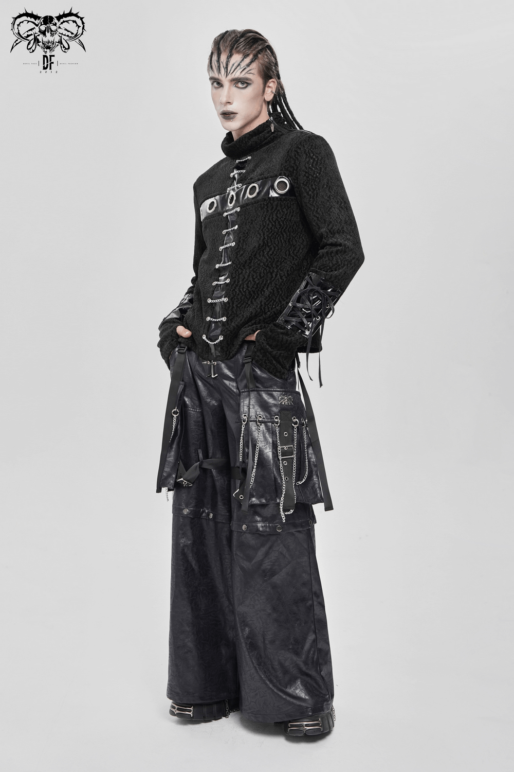 Bold Knit Turtleneck with Faux Leather Straps and Chains showcasing a punk aesthetic with eyelet and chain detail.