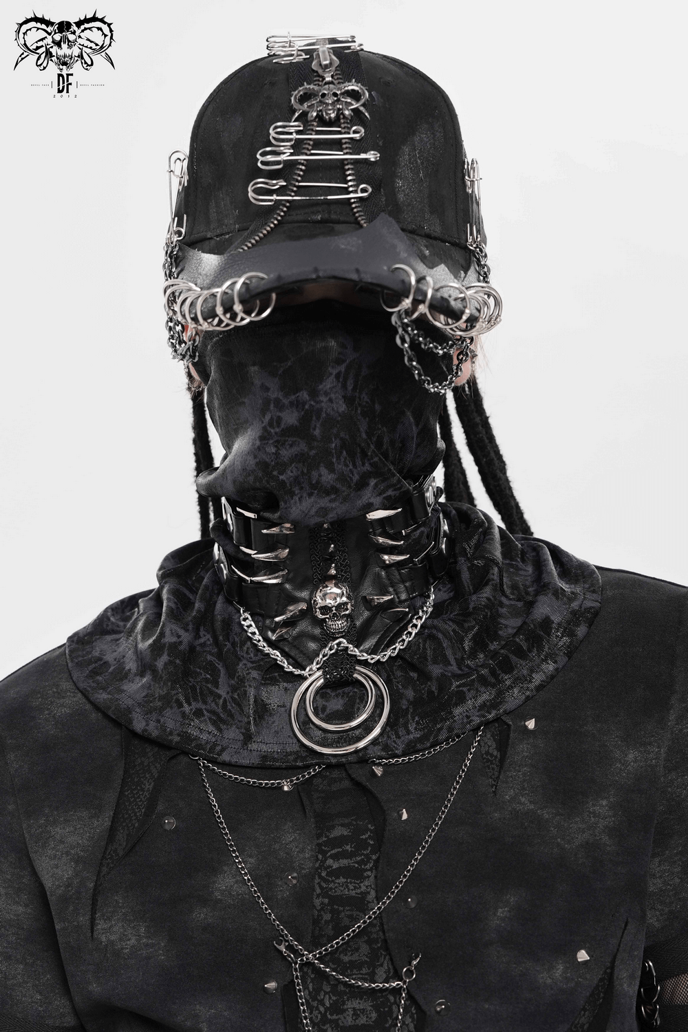 Bold Leather Choker with Spikes Accent and Metal Rings worn with a stylish gothic outfit featuring chains and accessories.