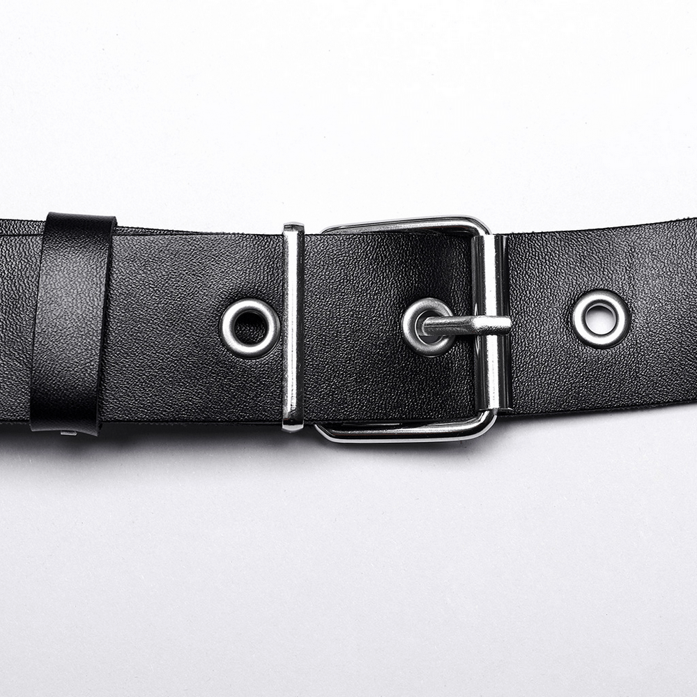 Close-up of a black PU leather strap with metal buckle and grommets, ideal for a bold body harness.