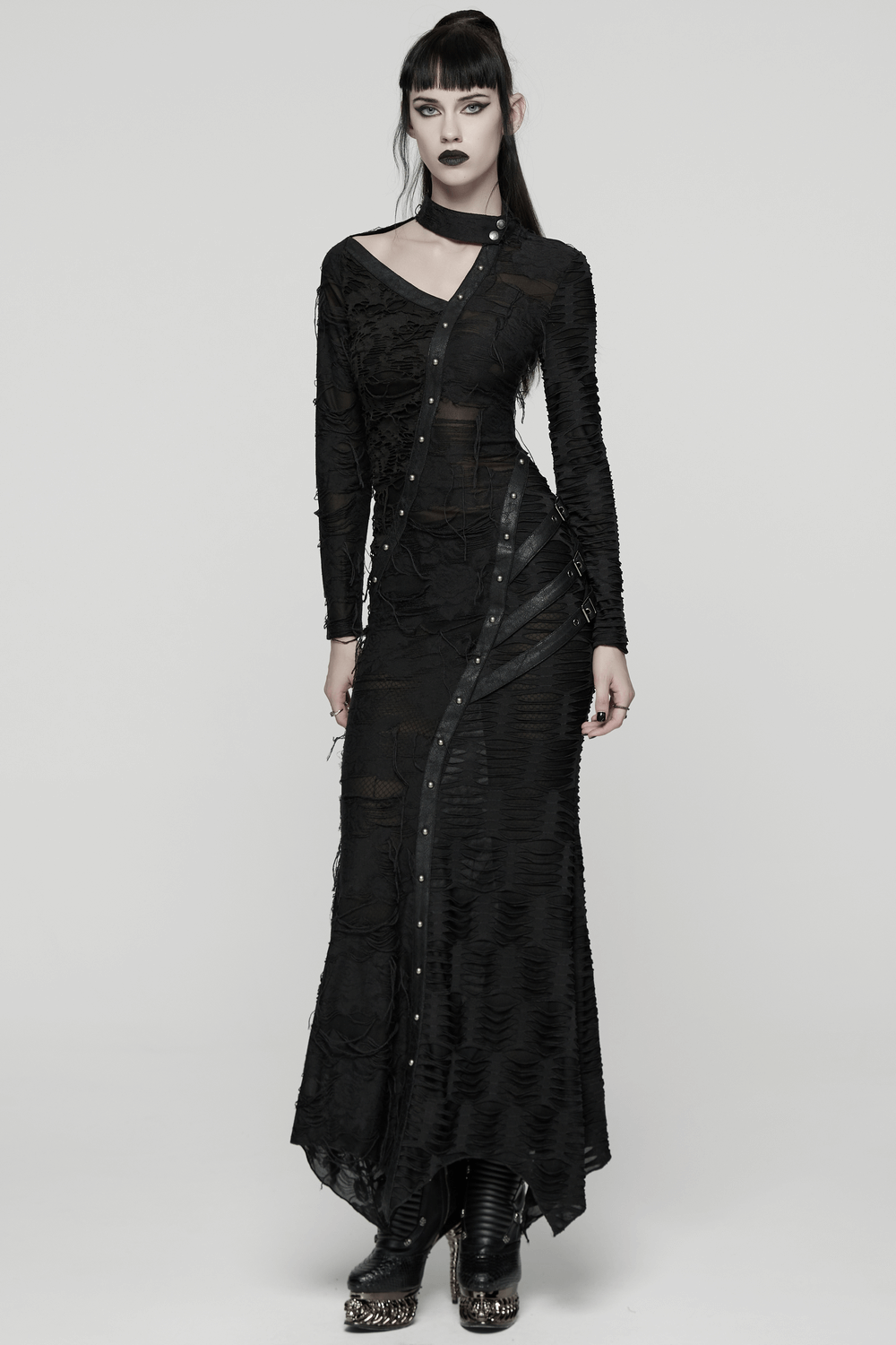 Bold Ragged Knit and Leather Long Asymmetric Dress worn by a model with a punk aesthetic, featuring rivet detailing and flowing cut.