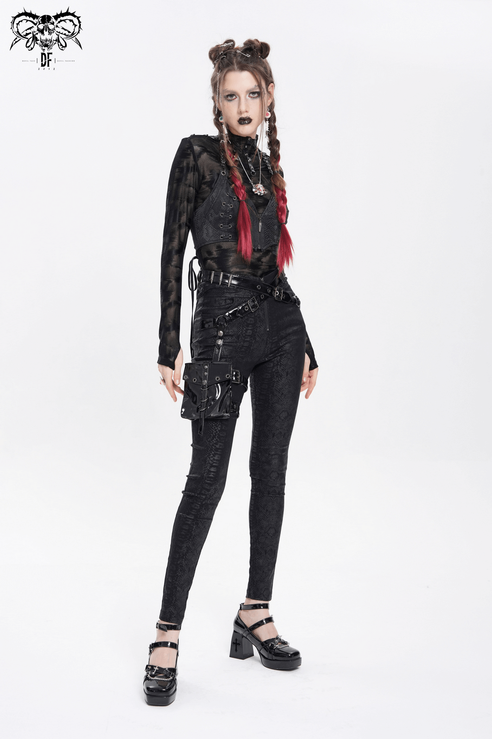 Gothic skinny pants with straps and detachable pouch, styled with a sleek high-waisted fit and edgy accessories.