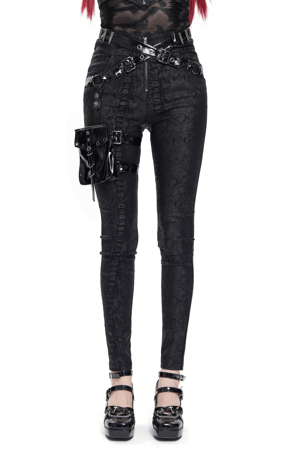 Bold skinny pants with straps and a detachable pouch, featuring snakeskin pattern and faux leather accents.