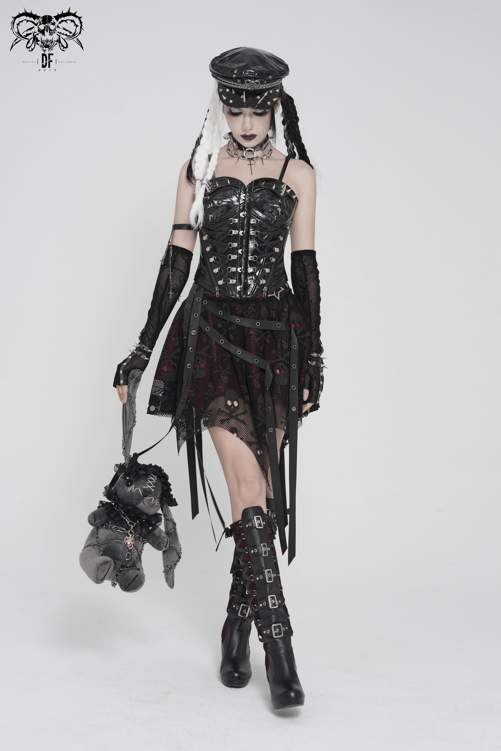 Bold Spike Corset Top with Lace Up Punk Hardware worn by a model with gothic styling and edgy accessories.