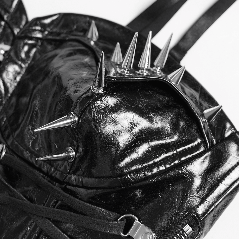 Bold Spike Corset Top with Lace Up Punk Hardware showing glossy faux leather and sharp spikes detail.