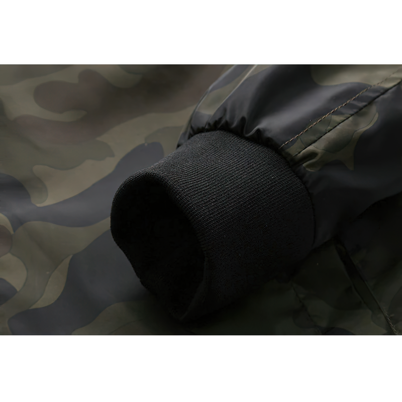 Close-up of bomber men's jacket cuff with black ribbed knit, showcasing camouflage fabric design.