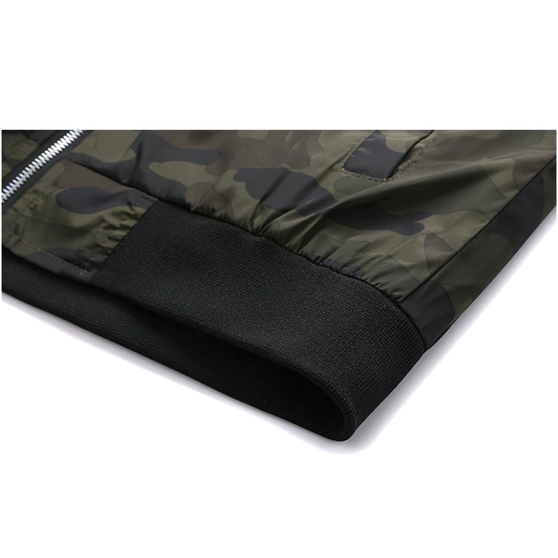 Detail of the cuff and fabric on a camouflage bomber men's jacket with pockets and zipper closure.