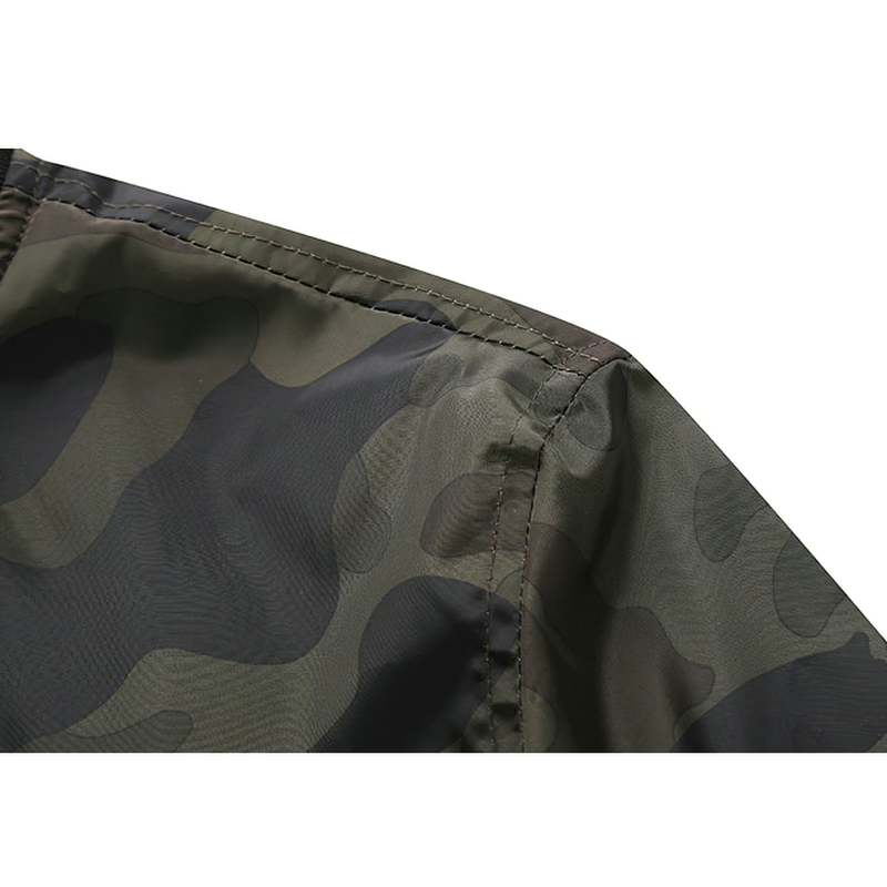 Close-up of camouflage fabric on a bomber men's jacket showcasing stitching details and pattern design.