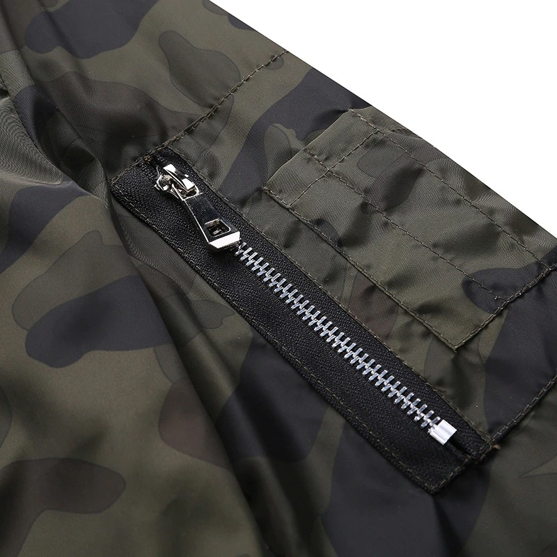 Close-up of the zipper pocket on a camouflage bomber men's jacket, showcasing stylish and functional design features.