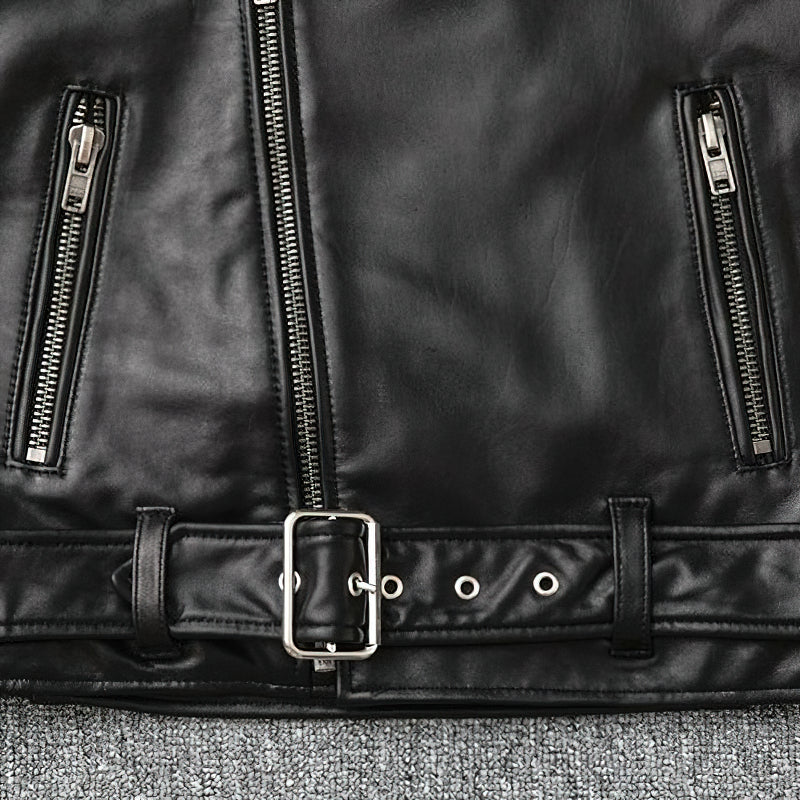 Close-up of a black genuine leather biker jacket showcasing zippers and adjustable removable belt.