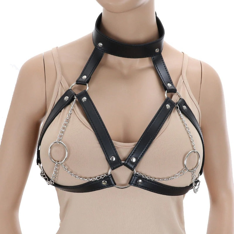 Faux leather breast bondage harness belt with chains, perfect for a daring gothic look.