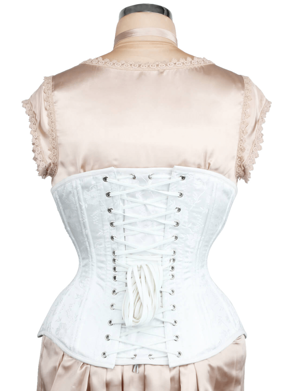 Back view of a white brocade underbust corset featuring adjustable lace-up design and modesty panel, ideal for waist training.