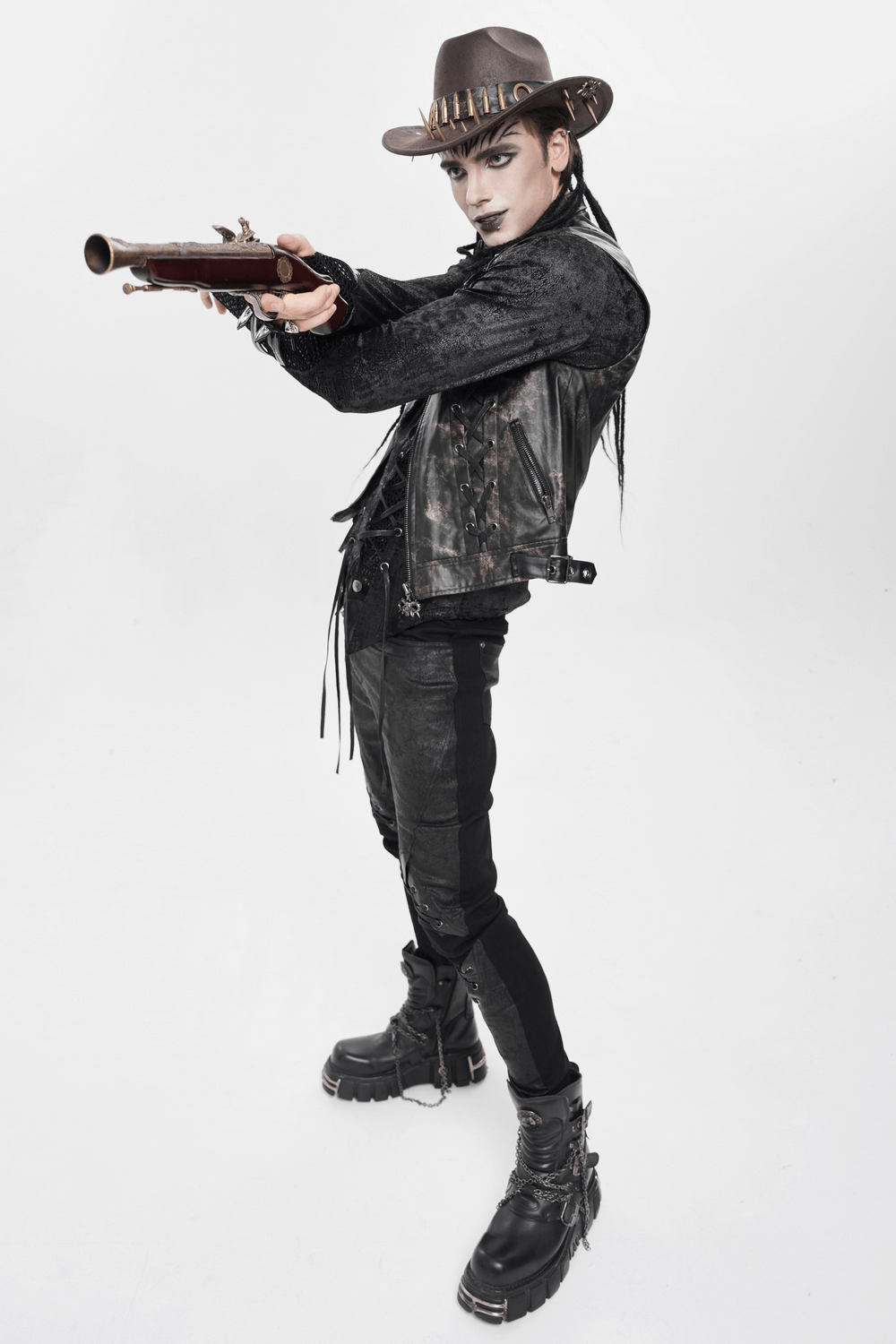 Brown Gothic Cowboy Hat with Resin Bullets and Studs worn by a figure in gothic attire aiming with a rifle.