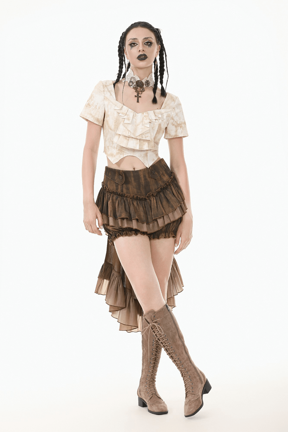 Model wearing brown steampunk ruffled skirt shorts with a cascading train and vintage-inspired details.