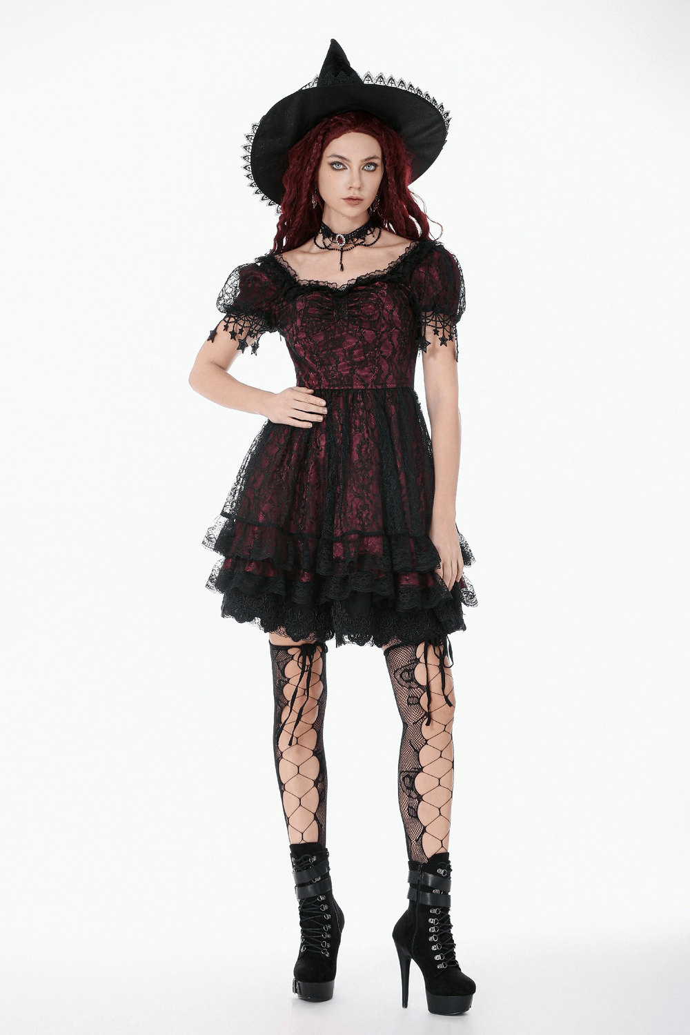 Burgundy Gothic Lace Corset Dress with Star Charm Sleeves modeled by a woman in a stylish hat and fishnet stockings.
