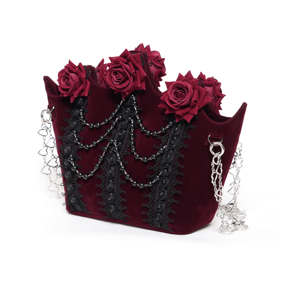Alt Tag: Burgundy Gothic Rose Handbag with Lace and Chains in burgundy velvet with rose appliques, black lace panels, bead drapes, heart chains
