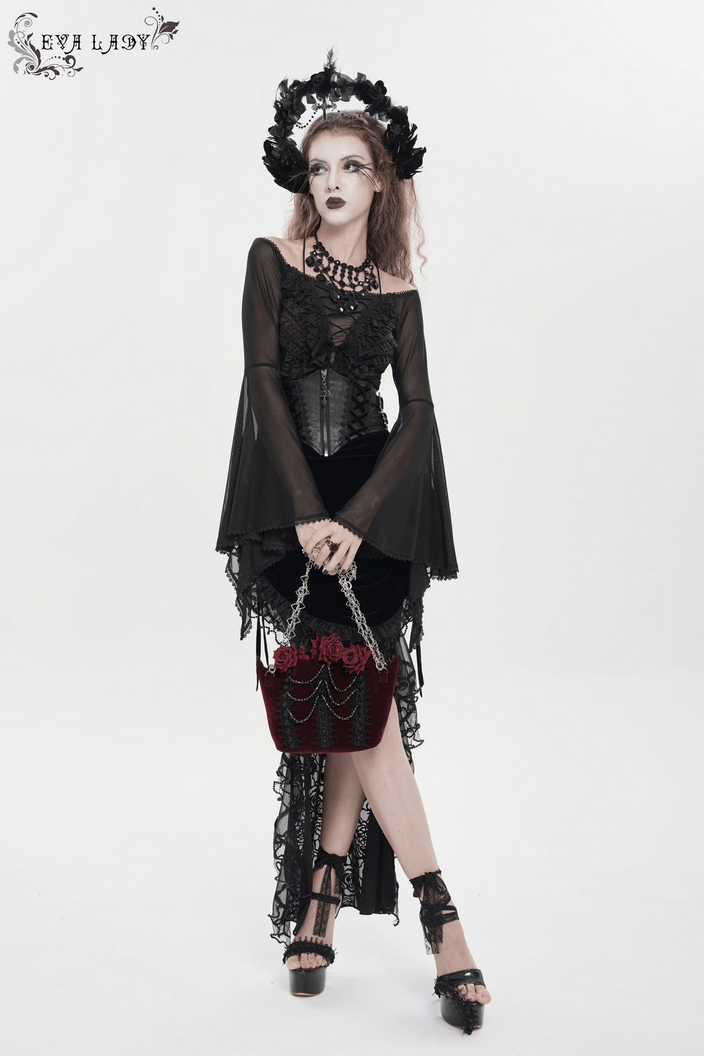 Alt Tag: Burgundy Gothic Rose Handbag with Lace and Chains held by model in black gothic dress, velvet floral purse with lace and chains