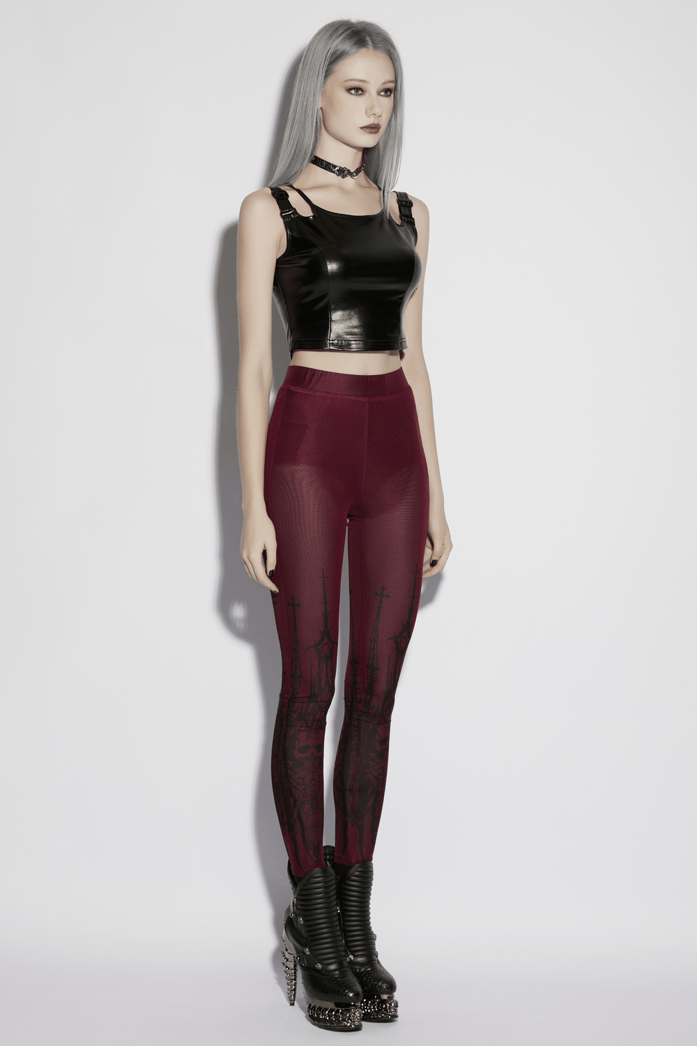 Burgundy Gothic Skull Church Print Mesh Leggings displayed on a model styled in gothic fashion with a crop top and platform boots.