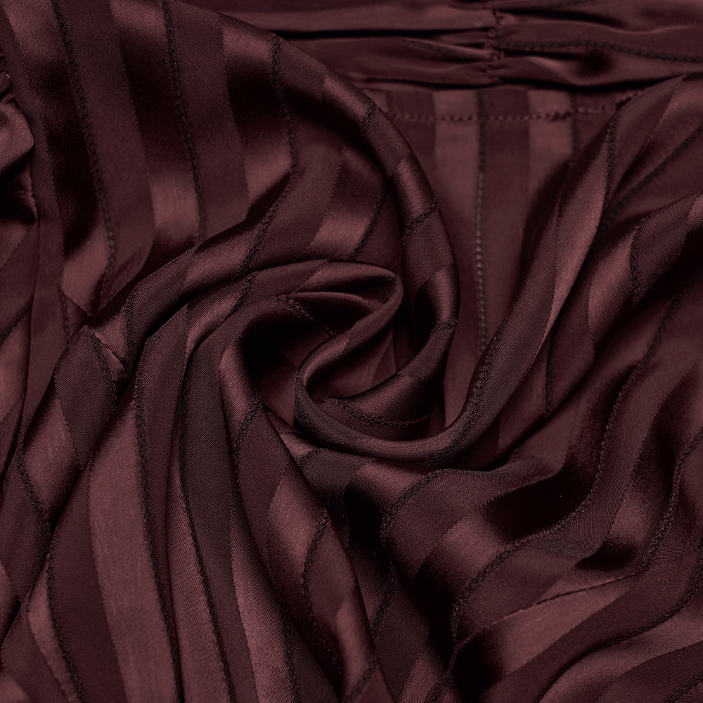 Close-up of the fabric showcasing the Burgundy Gothic Striped Lace-Up Puff Sleeve Shirt's rich texture and luster.