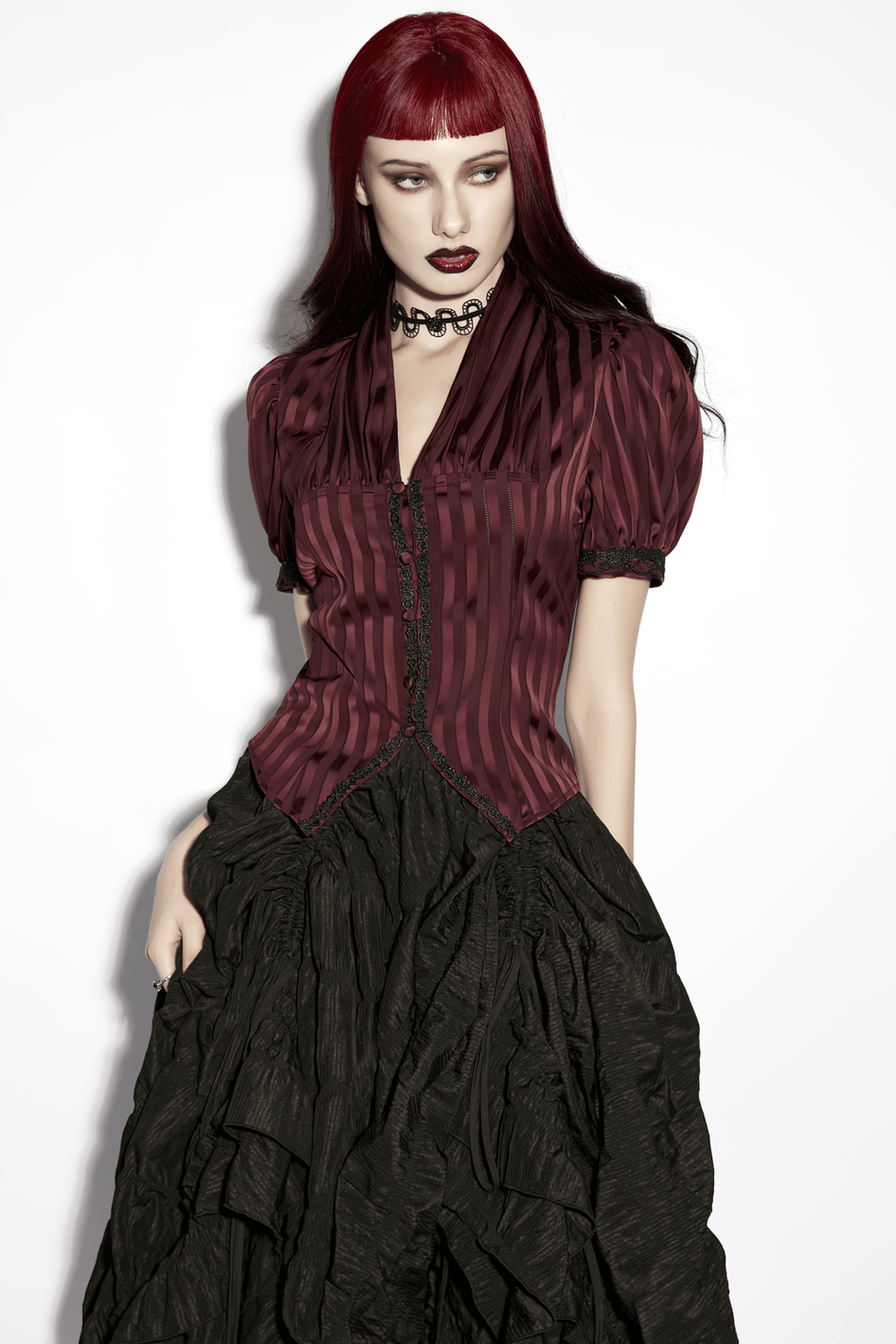 Burgundy Gothic Striped Lace-Up Puff Sleeve Shirt worn with a black skirt, showcasing gothic fashion style.