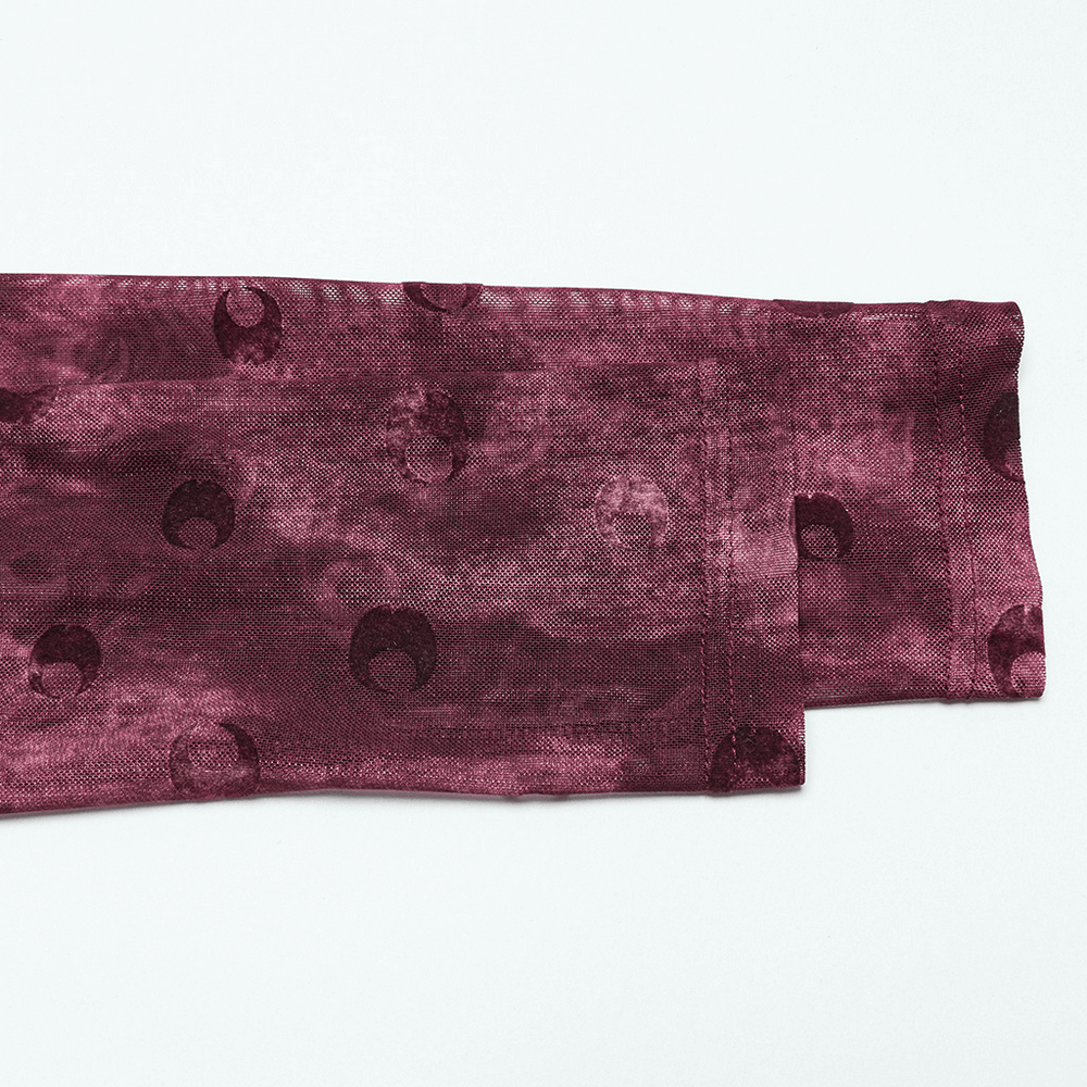 Burgundy mesh fabric detail with crescent print design, showcasing gothic-inspired fashion texture.