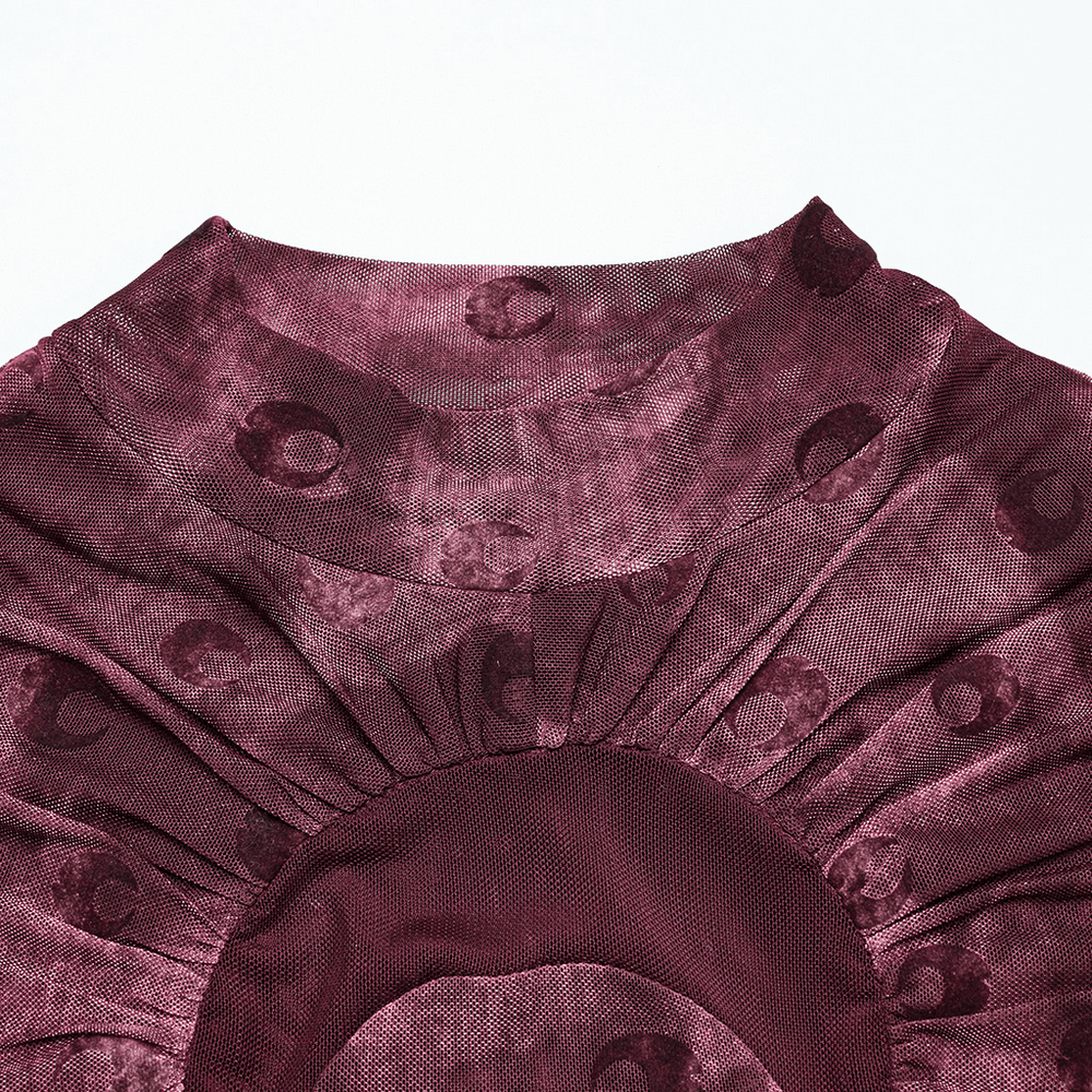 Close-up of burgundy mesh long sleeve top showcasing crescent print design and stand-up collar details.
