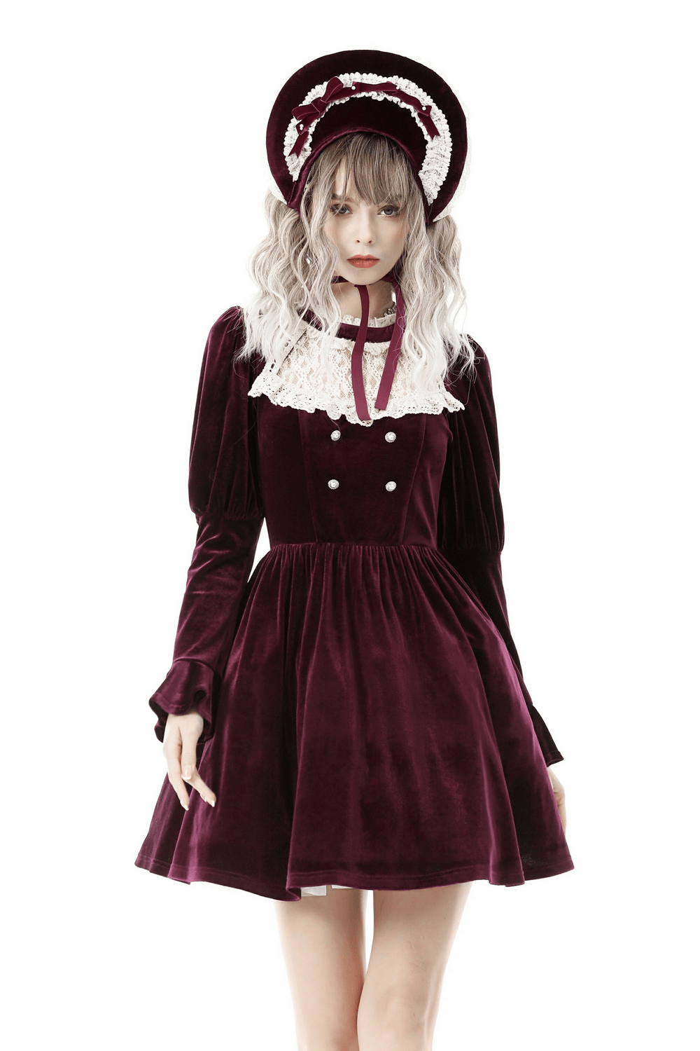 Burgundy velvet dress with lace collar and matching hat for a vintage-inspired look.