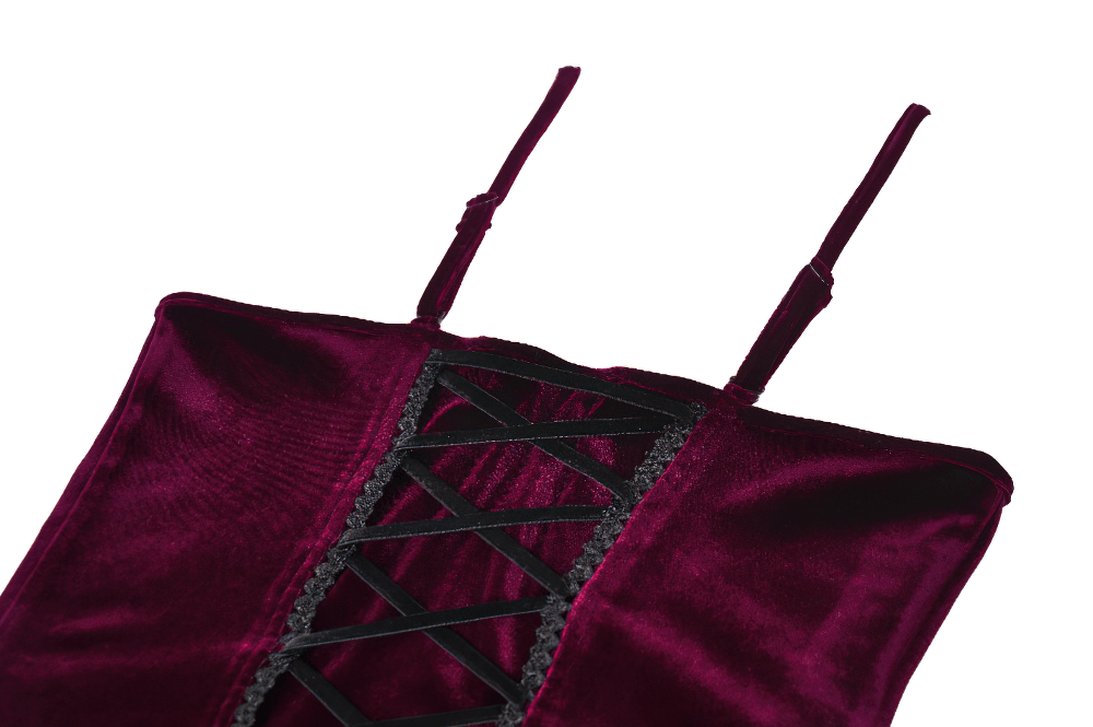 Burgundy velvet lace corset top showing intricate lace-up design and delicate straps.