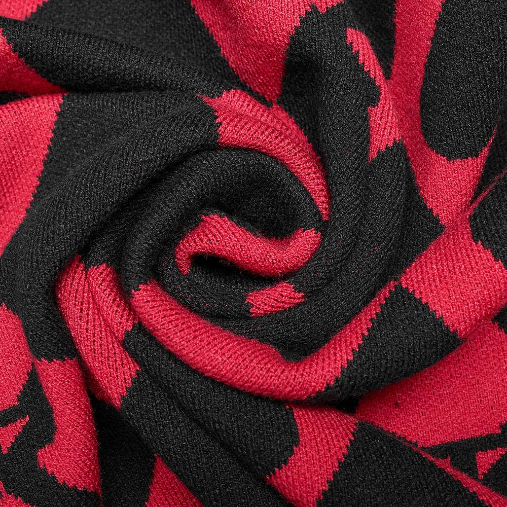 Close-up of diamond weave pattern fabric in black and red showcasing heart and butterfly designs.