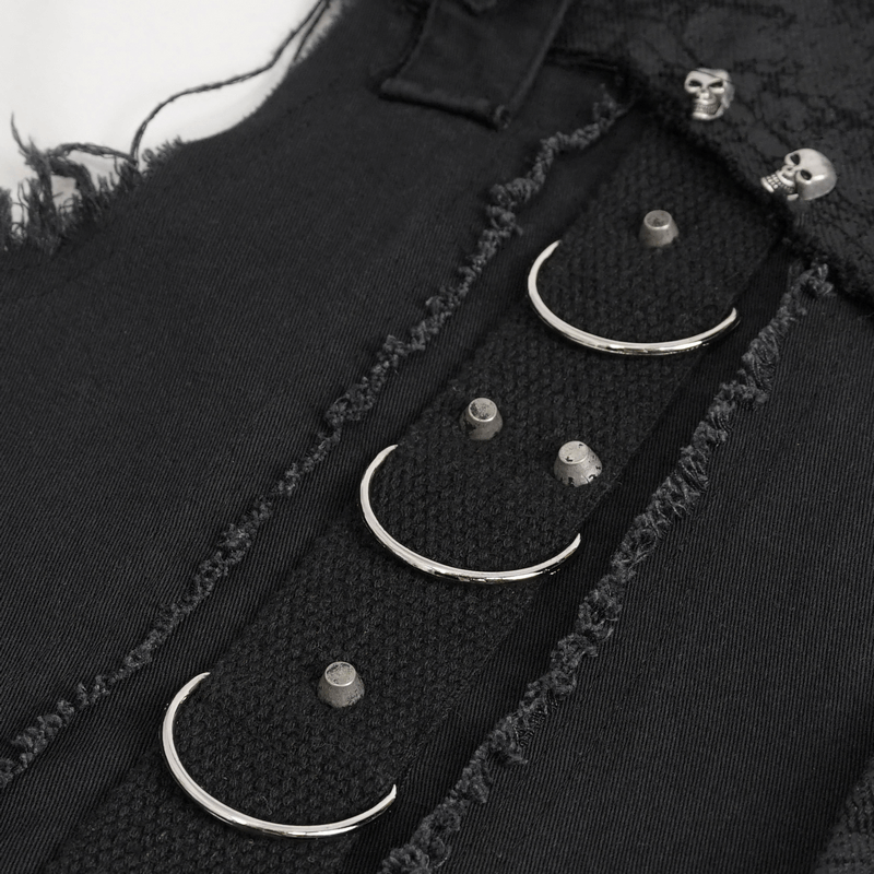 Close-up of punk men's sleeveless shirt featuring asymmetrical metal embellishments and distressed fabric.