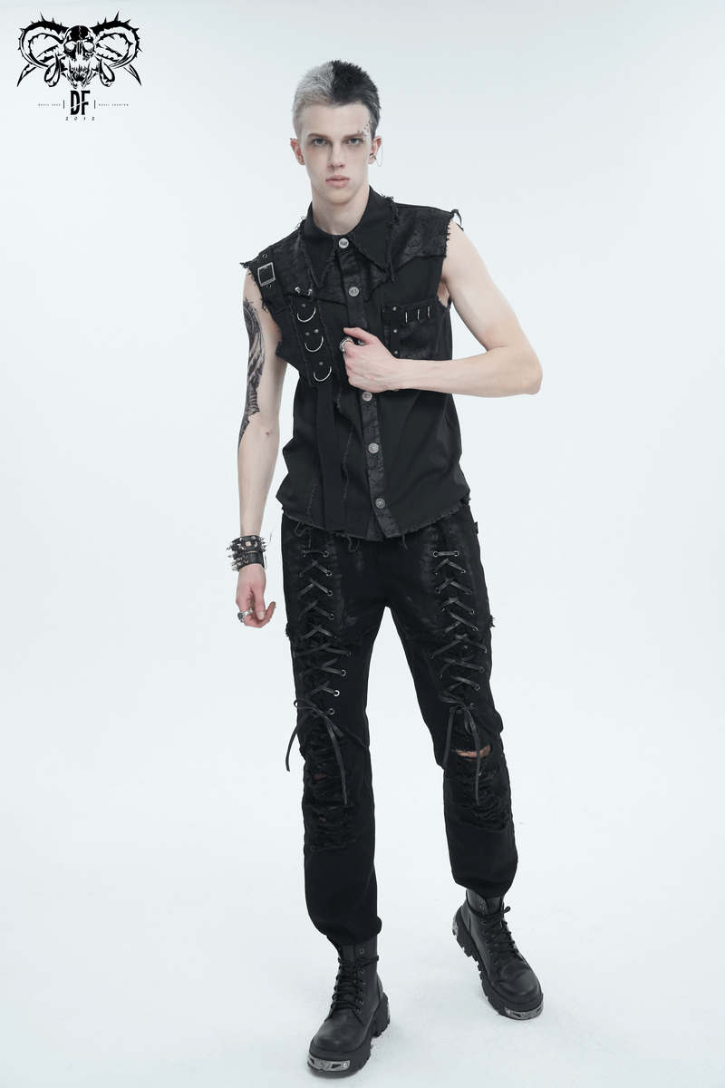 Men's punk button front sleeveless shirt with metal embellishments, styled with edgy black pants for a bold look.
