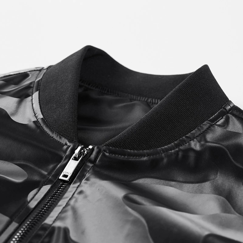 Close-up of the collar and zipper of a stylish camouflage PU leather jacket for men.