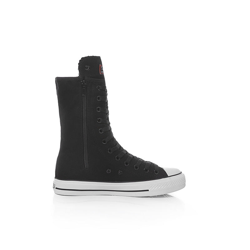 Black mid-calf canvas sneakers for women, featuring a lace-up design, perfect for rock and grunge styles.