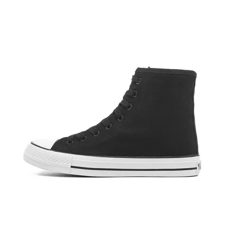 Black canvas mid-calf sneakers for women, perfect for a rock-inspired grunge style look.
