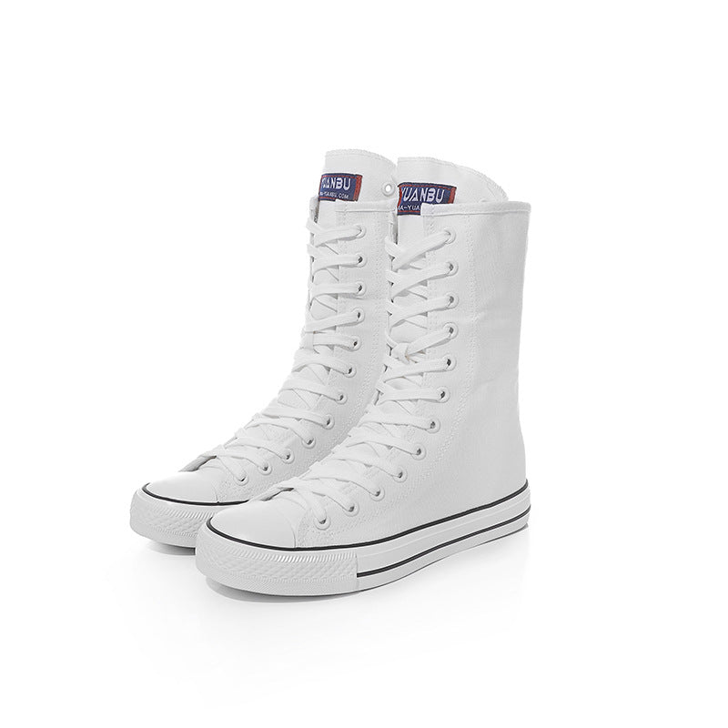 White canvas lace-up mid calf sneakers for women in rock style, perfect for a punk look or casual wear.