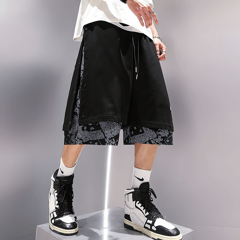 Men's punk style baggy drawstring shorts featuring bold print and comfortable silhouette, perfect for casual wear.
