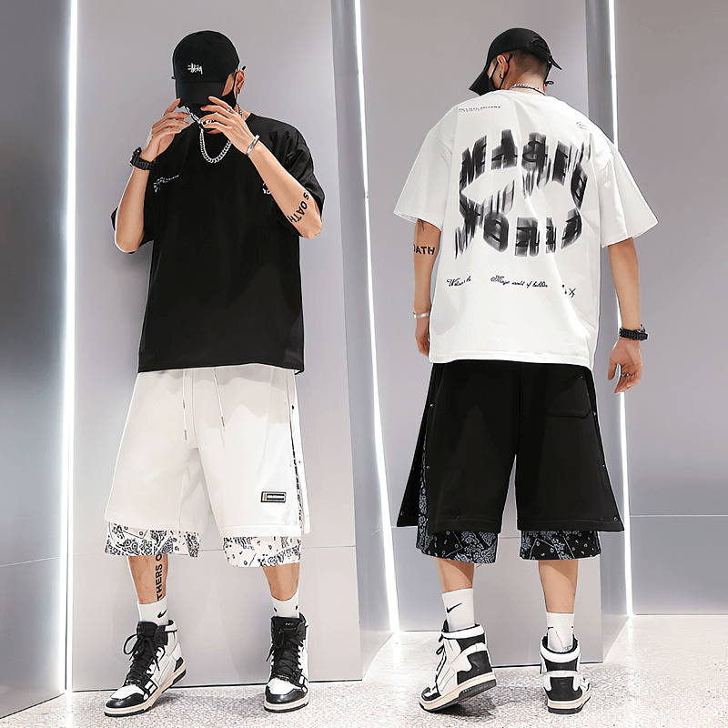 Men's punk style casual shorts showcased in black and white, emphasizing rebellious fashion with a bold print.