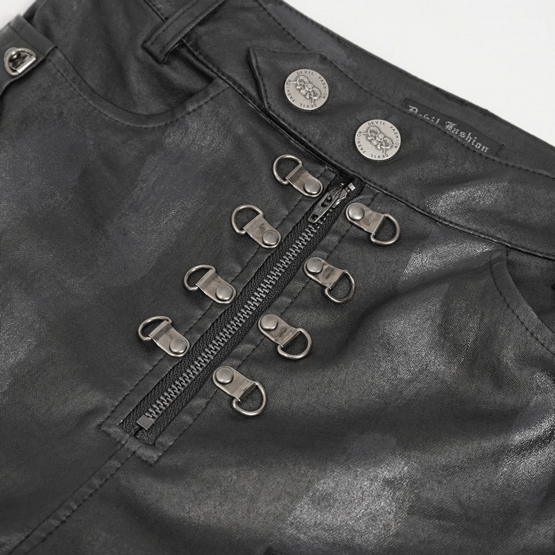 Close-up of women's black casual slim fit pants featuring edgy lace-up and zipper details with eyelets.