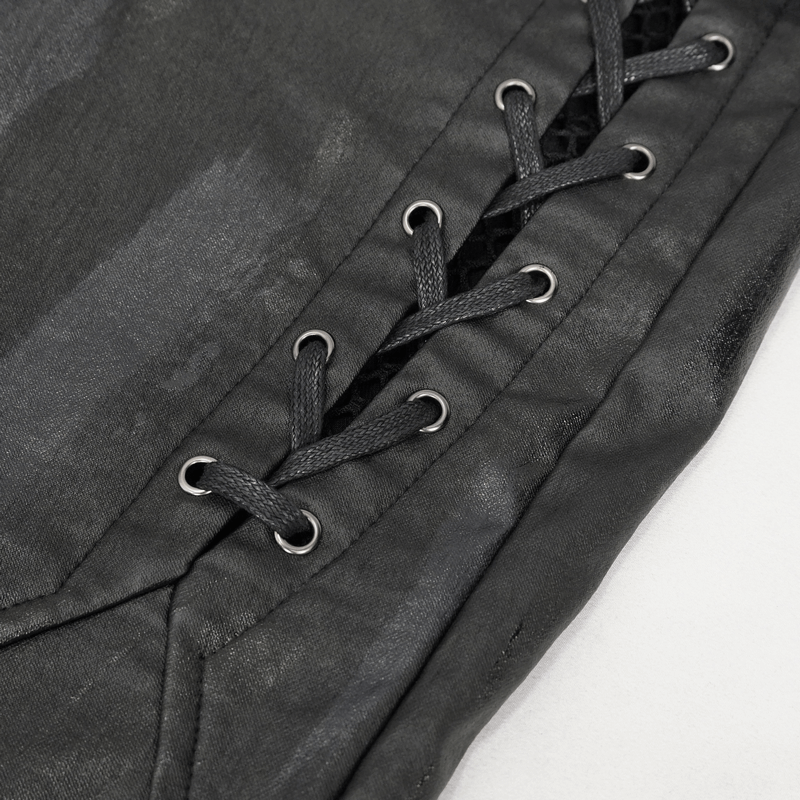 Close-up of black lace-up side detail on casual slim fit punk trousers with eyelets.