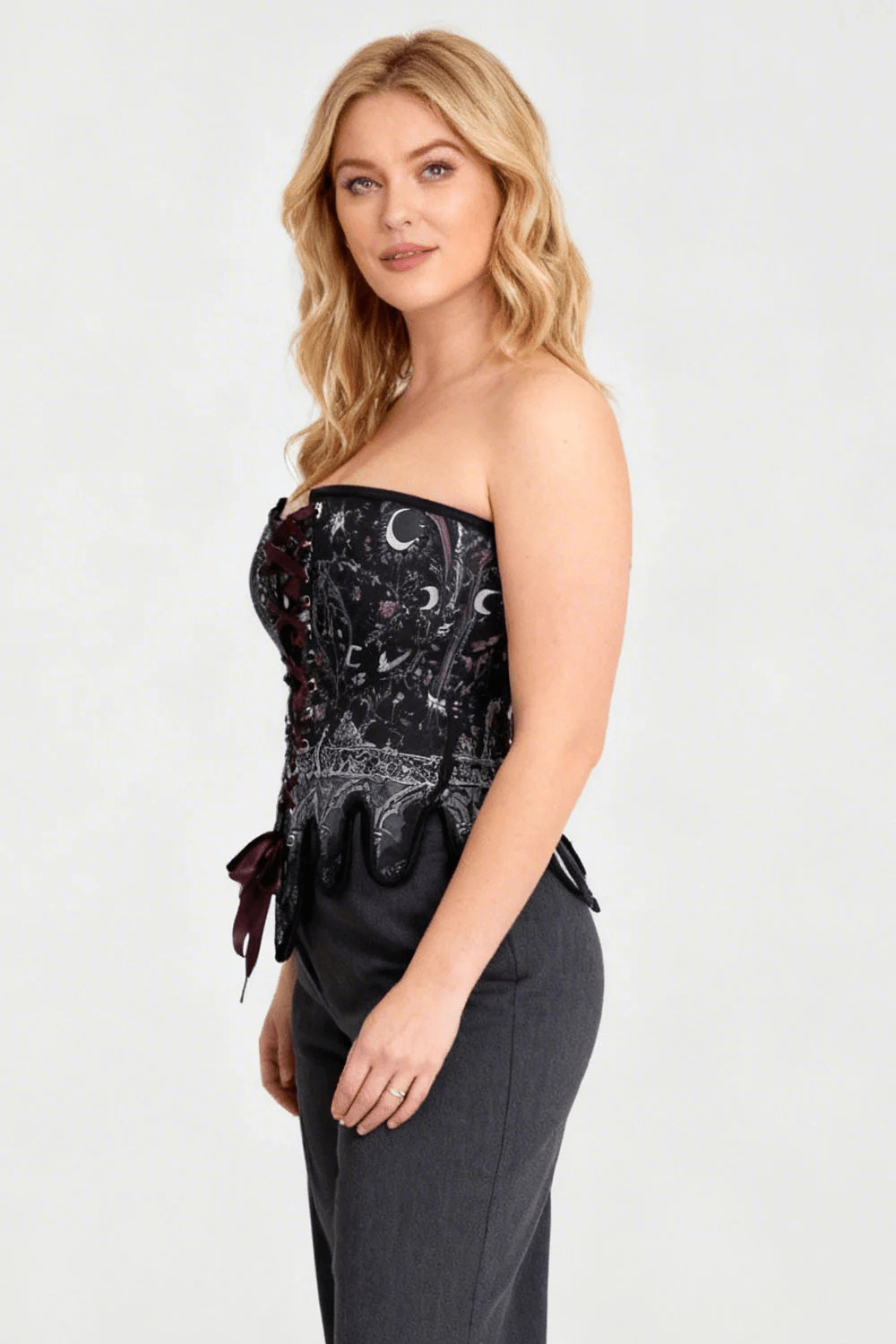 Celestial Gothic Overbust Corset with Lunar Print Details worn by a model, showcasing the beautiful lunar print and silhouette.