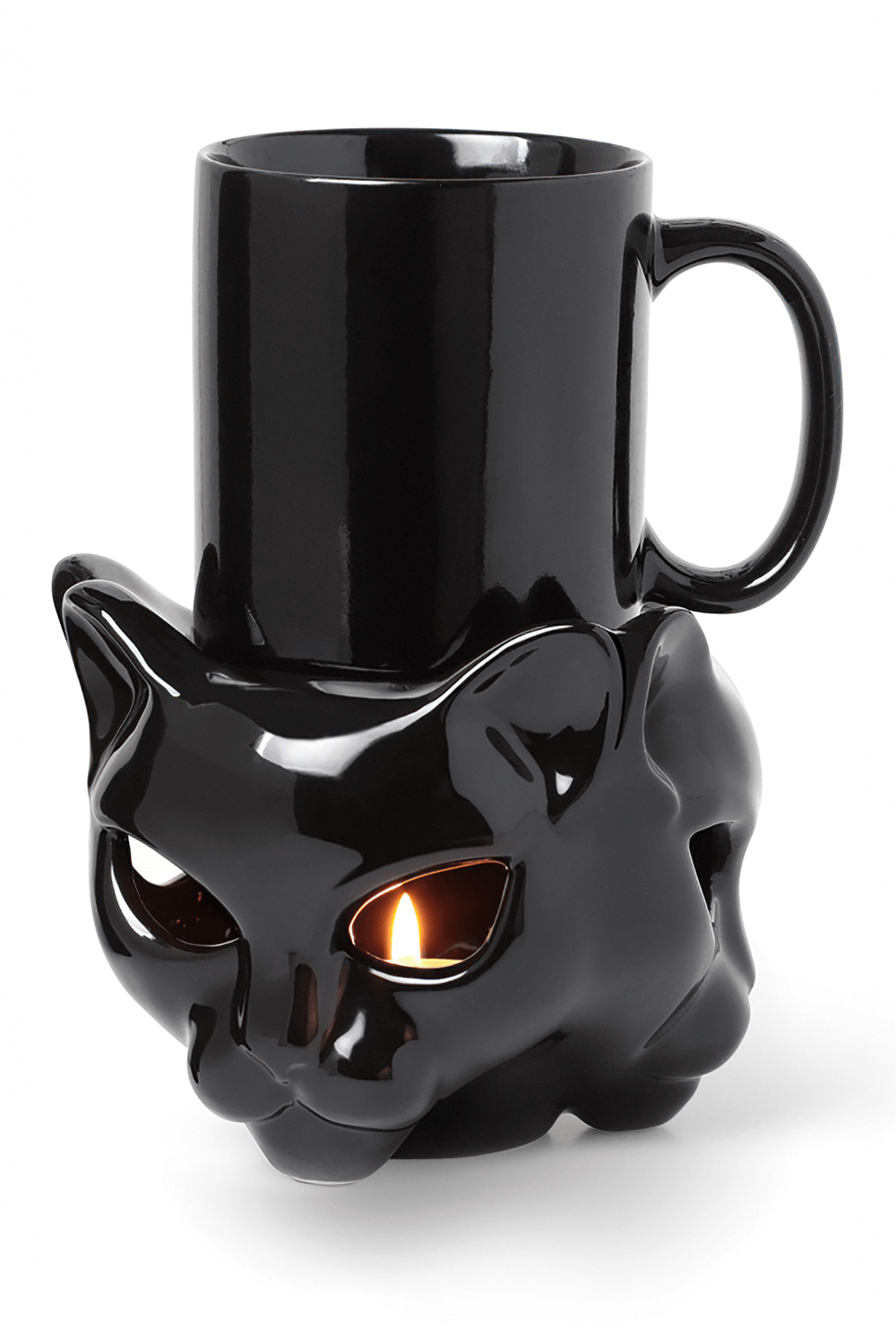 Gothic black ceramic cat head mug warmer with tealight holder, perfect for keeping drinks hot and casting spooky shadows.